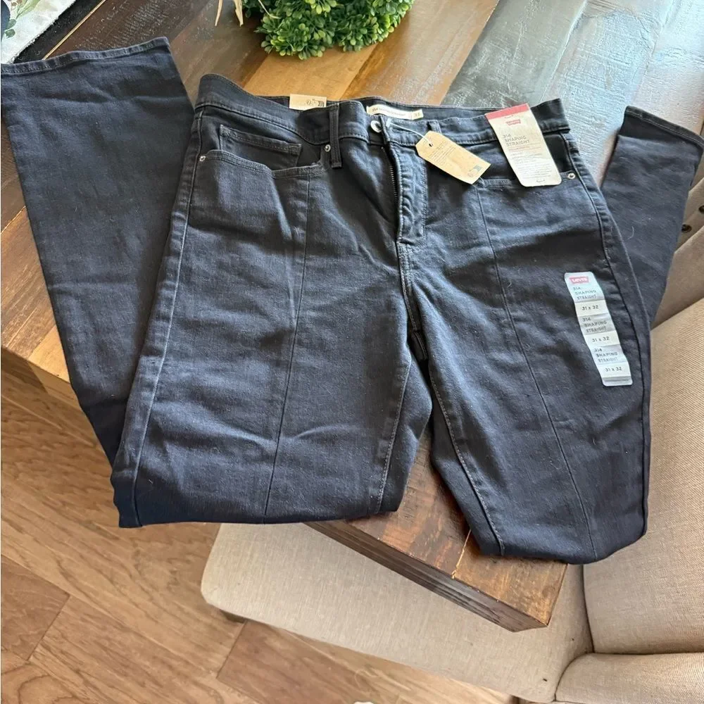 Levi’s 314 Shaping Straight Black Denim Jeans cut front ankle slit design